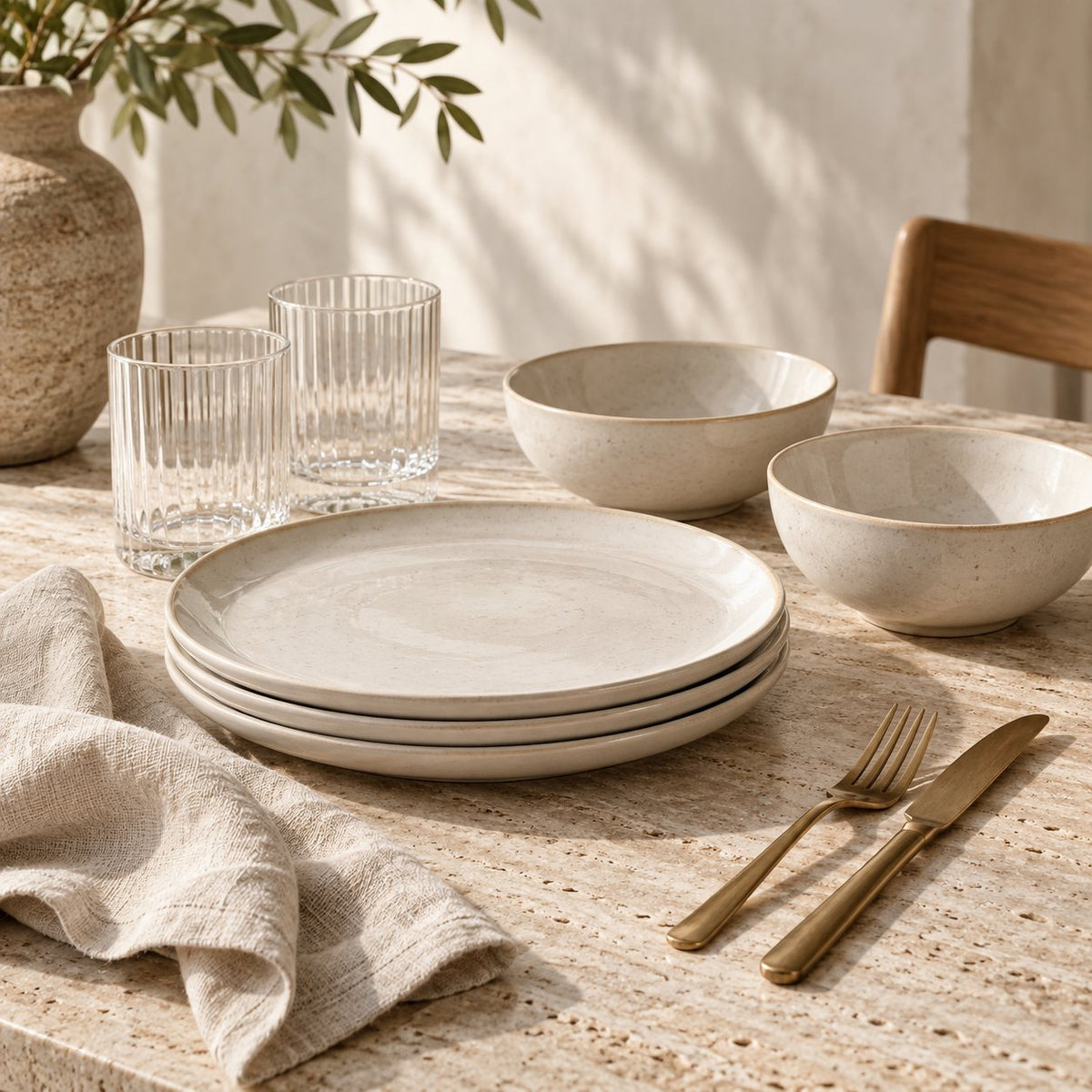 Kitchen & Dining collection: ivory stoneware plates, bowls, ribbed glasses and linen napkin