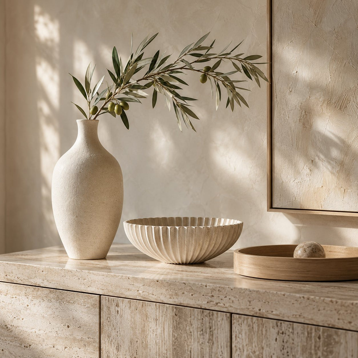 New & Trending collection: an ivory sculptural vase, fluted stone bowl and pale oak tray